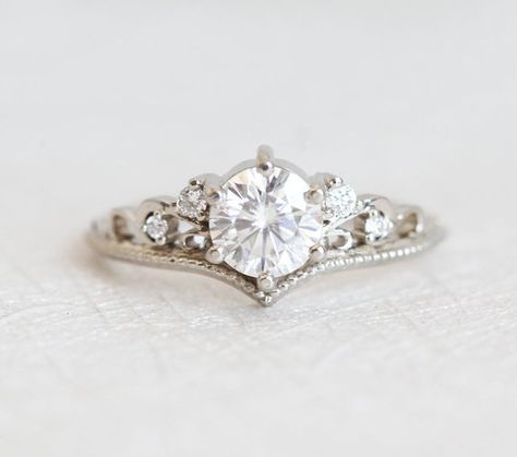 Beautiful vintage inspired round moissanite ring with diamonds Avaliable in 14 and 18k gold, platinum. Please select engagement ring or WHOLE SET option from the drop down menu. Other stones are also available: morganite, opal, pearl, turquoise, diamond, rose cut diamond, black diamond, Engagement Rings Vintage, Pretty Engagement Rings, Classic Wedding Ring, Vintage Inspired Engagement Rings, Round Moissanite Engagement Ring, Vintage Inspired Rings, Moissanite Bridal Sets, Oval Cut Engagement Ring, Classic Wedding Rings