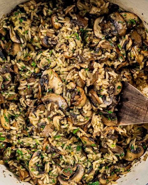 This delicious 30 minute Mushroom Rice is layered in savory umami flavor with mushrooms that are sautéed in butter with lots of garlic! #mushrooms #rice #mushroomrice #recipe Portabella Pasta Recipe, Mushroom Rice Recipes, Mushroom Fried Rice, Zucchini Rice, Basmati Rice Recipes, Recipes Sides, Spinach Rice, Rice Stuffing, Mushroom Risotto Recipes