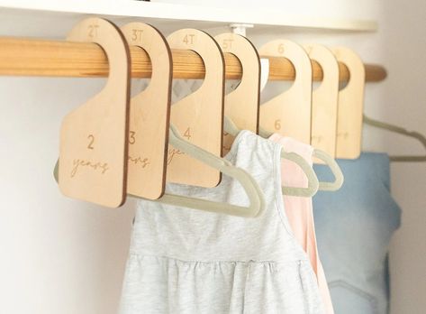 Hello Parents! We present to you our timeless Wood Closet Dividers, a simple yet powerful tool to categorize your toddler's clothes effortlessly. No more lost socks or mismatched outfits. Everything in its place, every time. That’s what we call efficient parenting! Nursery Hangers, Mismatched Outfits, Toddler Closet, Kids Clothes Organization, Toddler Organization, Clothes Dividers, Nursery Closet Organization, Baby Closet Organization, Baby Closet Dividers