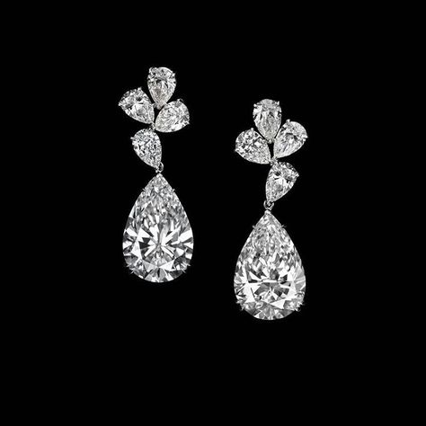 A perfect pair of pear shape diamond dangling earring. Pear Shape Diamond Drop Earrings, Pear Earrings Studs, Pear Shape Diamond Earrings, Pear Shaped Earrings, Solitaire Earrings Designs Unique, Dangling Diamond Earrings, Simple Diamond Earrings, Pear Diamond Earrings, Diamond Dangling Earrings