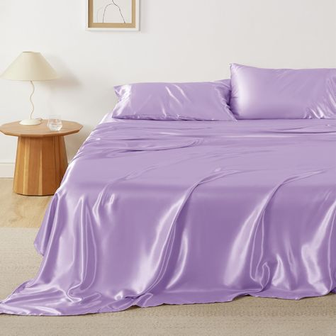 PRICES MAY VARY. Silky Texture: Designed to mimic the lavish feel of silk, these silky sheets offer exceptional softness, a buttery-smooth touch, and refined elegance, making them perfect Christmas gifts for her. This bed sheet is Standard 100 by OEKO-TEX certified, meeting the highest safety criteria for harmful chemicals. Skin and Hair-Friendly: The silky texture of satin is gentle on your hair and skin, preventing tugging and irritation throughout the night, making it an excellent choice for Light Purple Sheets, Purple Silk Bedding, Purple Silk Sheets, Pink Satin Sheets, Purple Bed Set, Lavender Room Aesthetic, Purple Bed Sheets, Lavender Bedroom, Silk Sheet Set