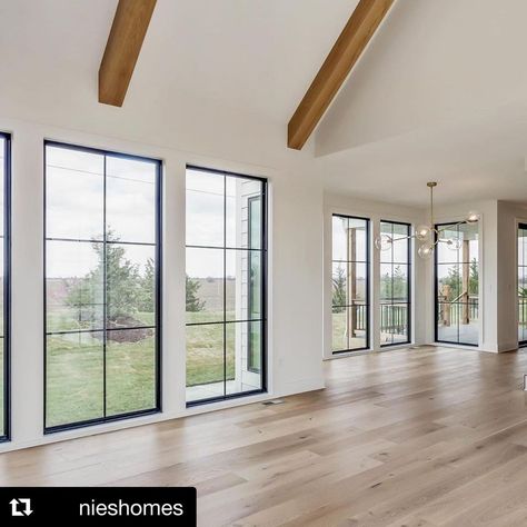 Windsor Windows on Instagram: “Can’t get enough of this incredible wall of Windsor Next Dimension painted black vinyl windows by @nieshomes. 😍😍😍 . . . #Repost @nieshomes…” Peak Windows Living Rooms, Big Picture Window Ideas, Long Black Windows Exterior, Modern Windows Interior, Large Home Windows, Big Windows Small House, Exterior House Black Windows, Great Room Large Windows, Home With Windows