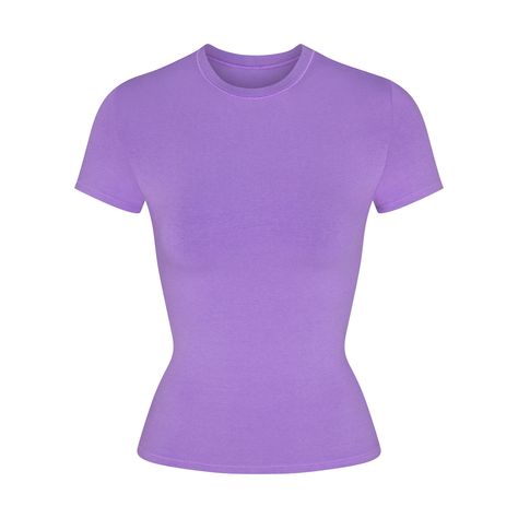 Our viral t-shirt in the cotton everyone craves. This perfect five-star tee is made with our stretchy, lightweight cotton that enhances your curves with its body-hugging fit and elevates your comfort with its incredibly soft feel. Features stitching details along the short sleeves and hem and hits below the natural waist. Fits true to size. Pink And Purple Clothes, Purple Shirt Outfits, Purple Top Outfit, Purple Shirts, Purple Clothes, Preppy Clothing, Purple Tops, Preppy Clothes, Purple Tee