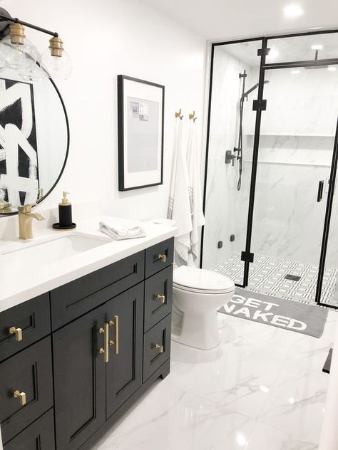 27 Budget-Friendly Bathroom Decor Ideas You'll Absolutely Love Farmhouse Bathroom Black Cabinets, All One Tile Bathroom, Powder Bathroom With Shower Ideas, Small Bathroom Ideas Stand Up, Bathroom Remodel Dark Vanity, Full Bathroom Tile Ideas, Bathroom Remodel Black Hardware, Black And White Restroom Ideas, Bathroom Ideas With Black Cabinets