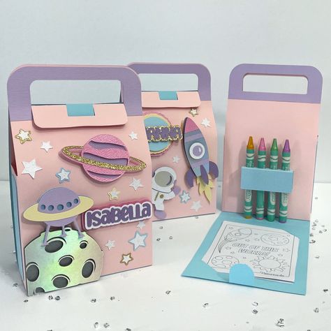 This amazing outer space activity box is the ideal gift for children's parties, this coloring station is an activity box that can be customized with the name or age you need, this is a nice idea to decorate a Nasa, Space, Rocketship or Galaxy style parties. -This is my new store for physical shipping items, but you can see my reputation in my Etsy digital store MonchisDesigns -If you want a specific theme or design, you just have to ask me. -If you need a different quantity, send me a message before placing the order. -Any questions please feel free to messages! DOES NOT INCLUDE CRAYONS Each box includes 4 printed sheets! The measurements of the finished box are: -6.29in tall (16cm) -4in wide (10cm) -2.4in deep (6cm) (4cm is the space of the box and 2cm is the area of the crayons) The boxe Activity Boxes For Kids, Kids Party Favor Ideas, Coloring Station, Space Party Favors, Space Activity, Gift Stores, Galaxy Style, Astronaut Party, Activity Box