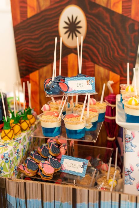 Stitch Birthday Party Ideas | Stitch Birthday Cake | Made It. Ate It. Loved It. Disney Stitch Party Food, Stitch Party Snacks, Stitch Charcuterie Board, Lilo And Stitch Charcuterie Board, Stitch 1st Birthday Party Ideas, Lilo Party Ideas, Hawaiian Stitch Birthday Party, Stitch Fruit Tray, Stitch Theme Desserts