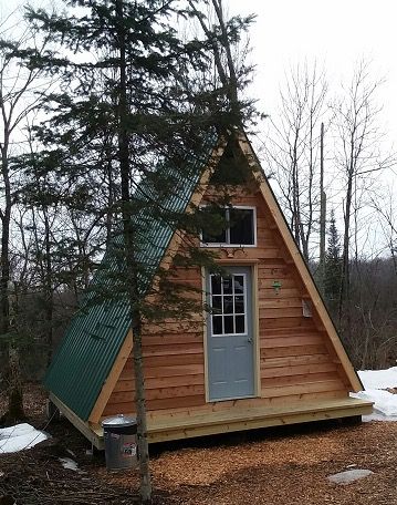 14x14 A-frame tiny cabin built from one of LaMar Alexander's plans Small A Frame Cabin, Tiny A Frame Cabin, A Frame Cabin Plans, A Frame Cabins, A Frame House Plans, Frame Cabin, Tiny Cabins, A Frame Cabin, Tiny Cabin