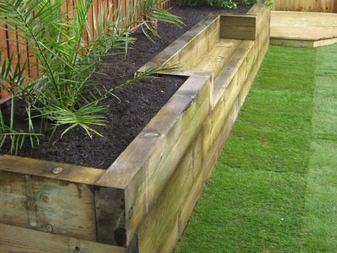 Bench set into sleeper raised bed Railway Sleepers Garden, Sleepers In Garden, Raised Flower Beds, Railway Sleepers, Have Inspiration, Raised Bed, Back Garden, Small Backyard Landscaping, Small Gardens