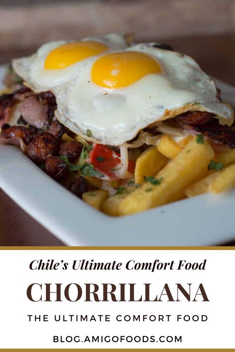 The chorrillana consists of a hefty serving of french fries topped with meat slices, fried eggs, and caramelized onion rings. It’s often served in large portions as the dish is for sharing. Chorrillana was first introduced in 1972 by Chilean dive bars and cafes in downtown Valparaiso. #chileanfood #chile #chorrillana #recipes #amigofoods Chilean Street Food, Chilean Food Traditional, Chilean Bread Recipe, 90s Playlist, Chilean Food, South American Recipes, Chile Recipes, Chilean Recipes, Dive Bars