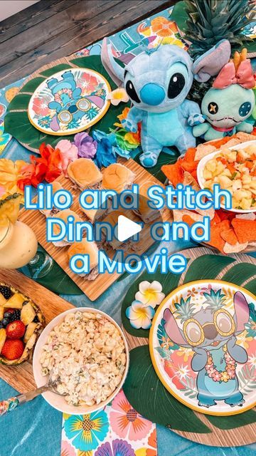 Heather Tenneson on Instagram: "Happy Stitch Day! Last week we celebrated Experiment 626 with a Lilo and Stitch Dinner and a Movie night with some good friends. We both have Stitch obsessed girlies, so we were thrilled to have them come and join in on the fun. 💙  On the menu: - Ohana Pinapple Salsa and Chips - Stitch’s Luau Pulled Pork Sliders - Experiment 626 Macaroni Salad - Island Roller Coaster Ride Pina Colada Cupcakes - Dole Whip Floats and Pina Colada Mocktails  This is the first movie night we’ve done from @thefairytalefoodie’s newest Dinner and a Movie cookbook and she absolutely nailed the island flavors. Every single dish was packed full of flavors straight from Hawaii. It was a culinary experience and a fun time fellowshipping with friends 🩵❤️🤍   #disneydinnerandamovie #disn Stitch Charcuterie Board, Lilo And Stitch Sleepover, Lilo And Stitch Menu Ideas, Lilo And Stitch Dinner And A Movie, Stitch Party Food Ideas, Stitch Birthday Food Ideas, Lilo And Stitch Desserts, Lilo And Stitch Dinner, Stitch Birthday Party Ideas Food