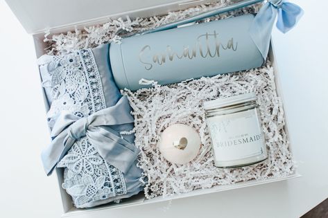 This gorgeous something blue full set bridesmaid proposal gift box packaging kit adds a perfect personalized touch to your bridal party gift giving. Our premium magnetic gift boxes perfectly holds a 20oz engraved tumbler, 8oz candle, a bath bomb and your personalized robes. Both sophisticated and simple yet elegant These boxes are perfect for your bridal party to enjoy on the big day (or any day!). Each box is customized with names of each bridal party members. SET INCLUDES- Large white magnetic Personalized Robes, Bridesmaid Proposal Diy, Bridesmaid Boxes, Bridesmaid Gift Boxes, Bridesmaid Box, Engraved Tumbler, Dusty Blue Weddings, Proposal Box, Future Wedding Plans