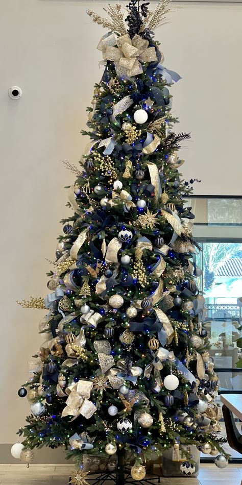 Blue And Gold Tree Decorations, Champagne And Navy Christmas Tree, Christmas Tree Navy Blue And Gold, Midnight Blue Christmas Decorations, Blue White And Gold Christmas Decor, Christmas Trees With Blue Decorations, Gold And Navy Christmas Tree, Midnight Blue Christmas Tree, Blue Silver Gold Christmas Tree