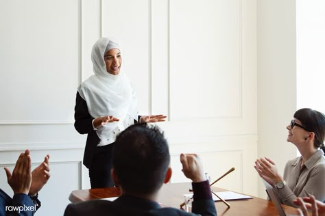 Muslim businesswoman presenting in an office meeting | premium image by rawpixel.com / Teddy Rawpixel Female Professor, Branding Moodboard, Office Team, Staff Training, Hand Pictures, Office Meeting, Home Black, Vision Board Ideas, Casual Home