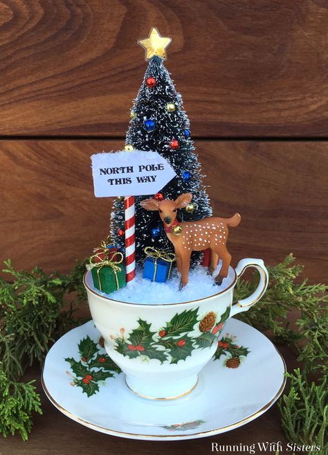 Make Teacup Christmas Scene with a bottlebrush tree and little reindeer. We'll show you how to make the North Pole sign and put it all together. Teacup Christmas, North Pole Sign, Pole Sign, Teacup Crafts, Vintage Christmas Crafts, Centerpiece Christmas, Deco Table Noel, For Christmas, The North Pole