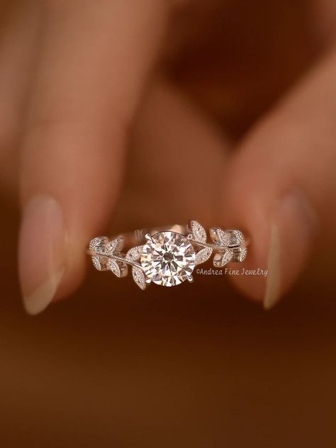 ◆Ring specs: 1: Metal Type: 14K Yellow Gold, 14K White Gold, 14K Rose Gold 2: Main Stone ⁃ Center Stone: Moissanite ⁃ Carat: 1.0 Carats ⁃ Shape: Round Brilliant Cut 3: Side Stones: Diamonds or Moissanites (Please select from the drop down menu) < Diamonds ⁃ Natural and conflict-free diamonds ⁃ Carat: - ⁃ Color: G-H ⁃ Clarity: SI-VS < Moissanites ⁃ Carat: - ⁃ Color: D-F ⁃ Clarity: VVS1 Also available in other colored gemstones upon request. Please get in touch with us! Production time Our jewelry is purely handmade, every production detail, we pay close attention to, every step of the production process, we will follow closely, our materials are ethical diamonds, gemstones and materials, please allow 2-3 weeks for production time, thank you! If you receive your customized jewelry, please be Nature Based Engagement Rings, Butterfly Wedding Ring Engagement, Rings Engagement Flower, Flower Shaped Wedding Ring, Wedding Rings Vine, Harry Potter Inspired Wedding Rings, Wedding Ring With Leaves, Engagement Rings Special, Engagement Rings Vine