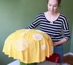 Toadstool Seats Diy, Mushroom Stools Diy, Diy Giant Toadstool, Diy Mushroom Table And Chairs, Umbrella Mushrooms Diy, Diy Mushroom Chair, Diy Giant Mushroom, Diy Mushroom Stool, Mushroom Crafts Diy