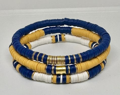 Navy and Mustard Yellow bracelet set, beaded bracelets, stacking bracelets, Boho bracelets, preppy bracelets, womens gift, custom bracelets by StackEmByShae on Etsy Blue Heishi Bracelet, Heishi Bracelet Ideas, Bracelets Preppy, Bracelets Stacking, Heishi Bracelet, Preppy Bracelets, Bracelets Boho, Yellow Bracelet, Denim Jewelry