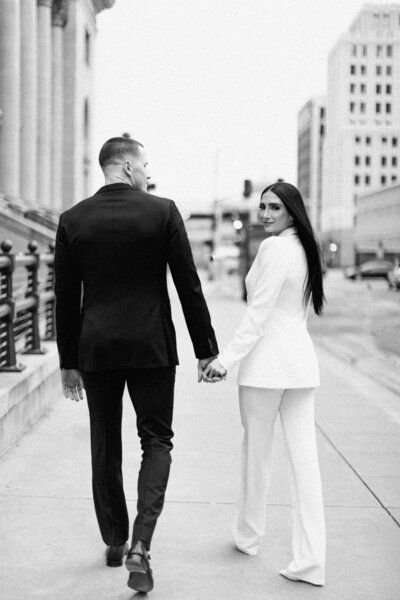 Reigh Walker, A Dallas Wedding Film Photographer Suit Engagement Photos, City Hall Wedding Photos, White Pantsuit, Dallas Engagement, City Engagement Photos, City Hall Wedding, Downtown Dallas, Wedding Couple Poses, City Engagement