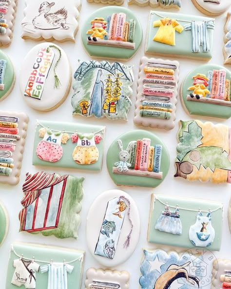 Madison Bagley on Instagram: "Full story book baby shower set! 📚 ⠀ What a fun set!! Details are always my favorite part of a set so when I started on this set I knew I wanted every cookie to be a little different. The books that my client wanted me to use were “Chica Chicka Boom Boom”, “Make Way For Ducklings”, “Goodnight Moon”, “Madeline”, “Officer Buckle & Gloria”, “Miss Spiders Tea Party” and “Rainbow Fish”. ⠀ Everything was hand painted using @americolor gels and ever clear. ⠀ Book cookie c Little Golden Books Baby Shower Theme, Storybook Baby Shower Cookies, Book Baby Shower Cookies, Madeline Baby Shower Theme, Book Sugar Cookies Decorated, Book Themed Cookies, Story Book Cookies, Story Book Baby Shower Themes, Book Cookies Decorated