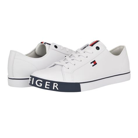 PRICES MAY VARY. This sneaker features the iconic Tommy Hilfiger flag logo along the side, global stripe detailing on the tongue, and branded bumpers on the outsole. Its memory foam cushioning provides comfort. Est. 1985, Tommy Hilfiger is a leading lifestyle brand celebrating the essence of American style. Round Toe ; Lace-Up Closure Faux Leather Upper Memory foam cushioned insole Rain Sneakers, Tommy Hilfiger Sneakers, Weather Wear, Sneakers Athletic, Flag Logo, Synthetic Rubber, Tommy Hilfiger Man, Toe Designs, Running Shoes For Men