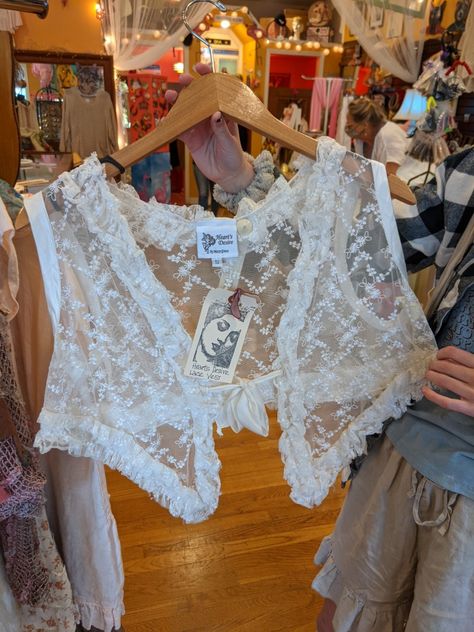 A lace vest. Lace Vest Outfit, White Lace Top Outfit, Cute Lace Tops, Lace Cardigan Outfit, Lace Top Outfit White, Lace Shirt Outfit, White Lace Vest, Lace Top Outfit, Vest Outfits Aesthetic