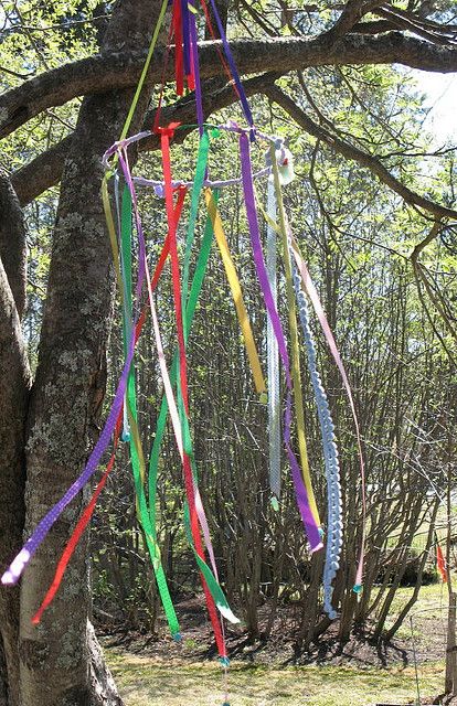 hmmm, gives me an idea of what to do with my old gazebo frame with a torn canvas top, line top with bright vinyl tablecloths and hand colored ribbons on the sides = kid happy gazebo!!! Ribbon Wands, Pagan Crafts, Sensory Garden, Rainbow Ribbon, Deco Nature, Vinyl Tablecloth, Beltane, Ribbon Crafts, Reggio Emilia