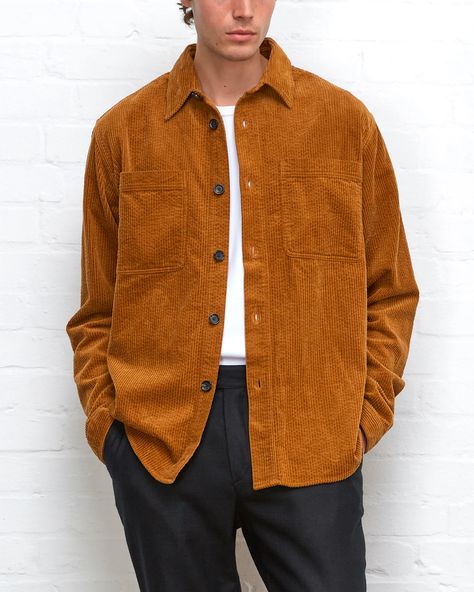 Man wearing a brown/burnt orange corduroy overshirt over a white T-shirt tucked into black tailored pants. This image was included in the article: 22 Luxury Brands Elevating The Shacket For Fall/Winter 2023, on MensFlair.com Corduroy Overshirt, Fall Winter Essentials, Shirt Tucked In, Twill Shirt, Vintage Military, Tailored Pants, Field Jacket, Mens Fashion Trends, Shirt Sale