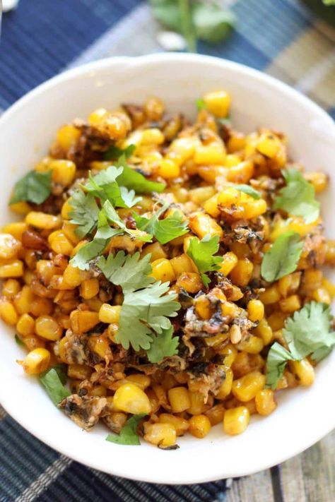 This Mexican Street Corn is so versatile and it's so easy to make! It can be eaten as a side dish, a topper or as a dip! The creaminess of the Cotija cheese mixed in the charred corn and incorporated with the mild spice of the jalapeno makes this dish irresistible! Add in some fresh squeezed lime juice, along with some seasonings and you are ready to dig into this Mexican Street Corn! #corn #Mexican #dip #appetizer #side #streetcorn #glutenfree | recipesworthrepeating.com Street Corn Recipes, Mexican Corn Recipe, Easy Mexican Corn, Canned Corn Recipes, Easy Mexican Street Corn, Mexican Corn Recipes, Mexican Street Corn Recipe, Street Corn Recipe, Mexican Corn Salad