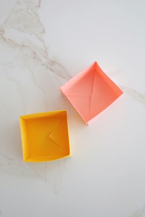 How to Make an Origami Box (with video!) - Childhood Magic How To Make A Small Box From Cardstock, Tiny Paper Boxes Diy, Origami Paper Box Tutorial, Paper Boxes Diy Folded Easy, Paper Box Origami, Origami Box With Lid, Origami Box Easy, Origami Easy Step By Step, Paper Cube