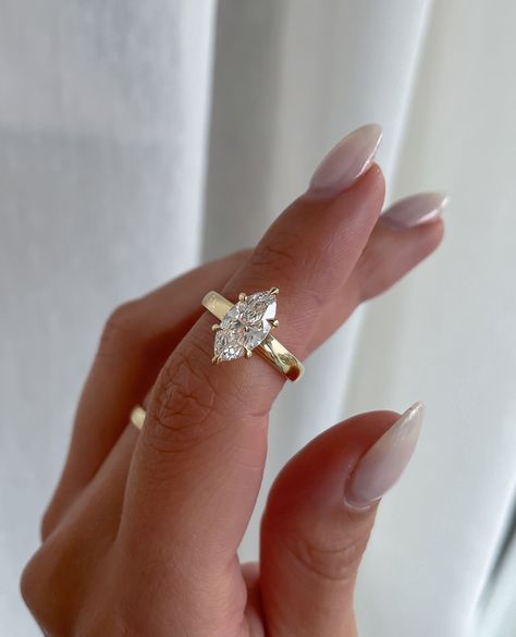 For lovers of the Marquise Cut✨️  Featuring a gorgeous 3.5mm band... we're kinda obsessed🤩   Details: Custom Stephanie - Marquise Solitaire 1.82cts | E | VVS1   #ringstagram #engagementring #stackablerings #ringinspiration #ringlover #customengagementring Marquise Engagement Ring With Wide Band, Marquise Ring With Thick Band, Custom Marquise Diamond Ring, 2 Carat Marquise Engagement Ring Gold, Marquise Diamond Ring Yellow Gold, Thick Gold Band Marquise Diamond, Wide Band Marquise Ring, Marquise With Thick Gold Band, Marquise Engagement Ring Thick Gold Band