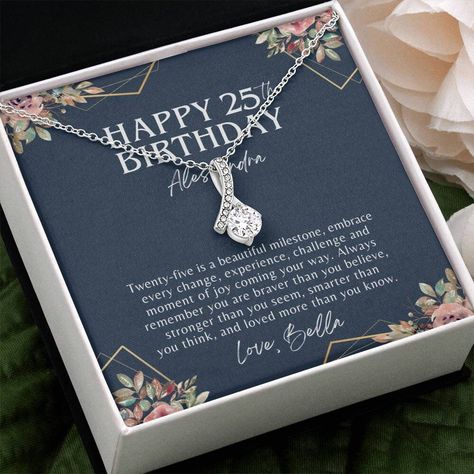 "25th Birthday Necklace Gifts For Women - Happy 25th Birthday Gift Ideas With Personalized Message Card - Jewelry For 25 Years Old Woman ABOUT ALLURING BEAUTY NECKLACE Imagine Her Reaction When She Opens This Stunning Gift! The Alluring Beauty Necklace Features A Petite Ribbon Shaped Pendant That Is Sure To Dazzle Your Special Someone. - 14k White Gold Finish Or 18k Yellow Gold Finish Over Stainless Steel - 7mm Cubic Zirconia  - Pendant Dimensions: 0.8\" (20mm) height / 0.4\" (10mm) width - Adjustable Length: 18\" - 22\" (45.72 cm - 55.88 cm) - Lobster clasp READY TO GIFT AS-IS Perfect Present That Doesn't Need Wrapping, Ribbon Or Bows As It Comes With... - The Alluring Beauty Necklace - Personalized Message Card - A Choice Of Standard Or Luxury Jewelry Gift Box CONTACT US ANYTIME Our Prio Happy 34th Birthday, 29th Birthday Gifts, Happy 35th Birthday, Luxury Jewelry Gift, Happy 27th Birthday, Happy 29th Birthday, Happy 25th Birthday, Wrapping Ribbon, 25th Birthday Gifts