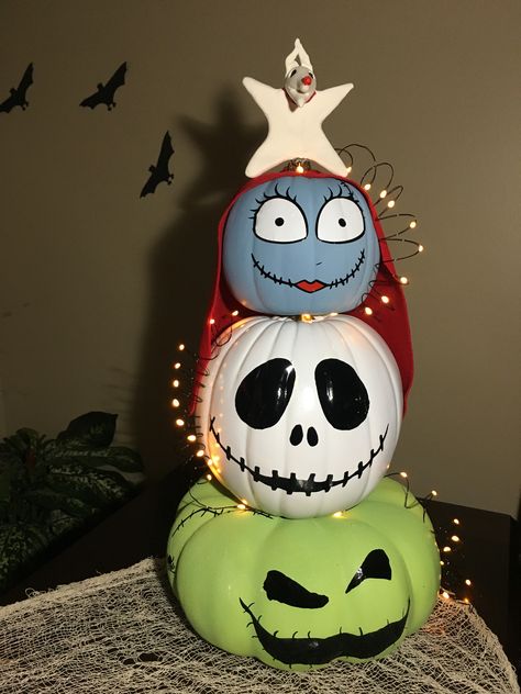 OogieBoogie, Jack Skellington, Sally, and Zero stacked to form a Christmas tree shape. Oogey Boogey Pumpkin, Tim Burton Pumpkin Painting, Cute Painted Pumpkin Ideas, Pumpkin Inspo, Calabazas Halloween, Pumpkin Paint, Nightmare Before Christmas Pumpkin, Moldes Halloween, Jack Skellington Pumpkin