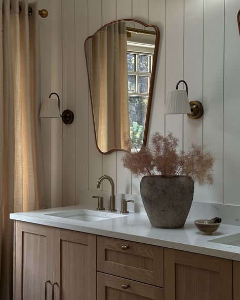 Your morning rituals with an upgrade. ✨ The existing primary ensuite in our client’s home lacked storage, had a cramped shower, and even walls that didn’t reach the ceiling! 😳 This timeless design makes the ensuite feel more spacious and functional with a double vanity, tall vaulted ceilings, shiplap cladding, and an extended shower. . . . . . . . #torontointeriordesigner #architecturaldigest #houseandhome #domino Timeless Primary Bathroom, Bathroom Wood Ceiling, Shiplap Wainscoting, Primary Ensuite, Ensuite Vanity, Vertical Shiplap, Toronto Interior Design, Shiplap Cladding, Shiplap Bathroom