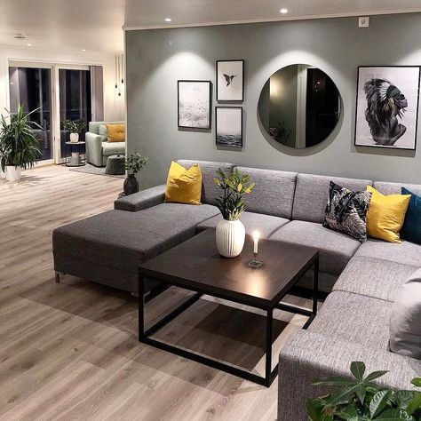 I like the arrangement of the picture frames and round mirror above the sofa. Mirrors Above Couch, Circle Mirrors, Above Couch Decor, Wall Mirror Decor Living Room, Couch Wall Decor, Mirror Decor Living Room, Picture Arrangements, Above Couch, Grey Couches