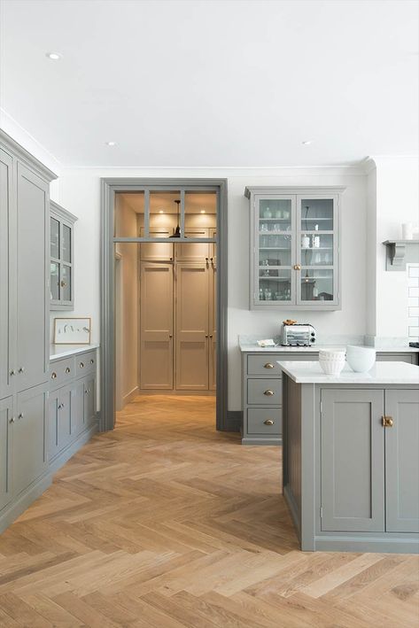 herringbone wood floor with gray shaker kitchen cabinets | design by DeVol Kitchens #flooring Grey Shaker Kitchen, Floors Ideas, Kitchen Cabinet Trends, Серая Кухня, Kitchen Ikea, Herringbone Wood Floor, Herringbone Wood, Devol Kitchens, Country Kitchen Designs