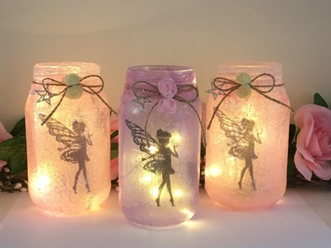 Brighten up your home (or someone’s day) with these beautiful light up fairy jars Fairy Light Jars, Fairy Jars Diy, Fairy Glow Jars, Fairy Mason Jars, Glow Stick Jars, Fairy Theme Birthday Party, Fairy Lights In A Jar, Fairy Baby Showers, Fairy House Crafts