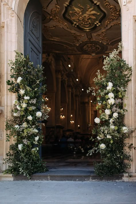 foliage and white column flower at church entrance Entrance Flowers Wedding, Wedding Flower Arrangements Church, Entrance Flowers, Entrance Wedding, Church Entrance, Wedding Gate, Rose Wedding Dress, Wedding Entrance Decor, Aisle Flowers