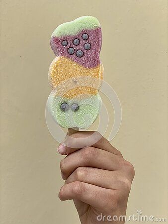 Creative composition for summer concept with a young girl hand holding a multi colored ice cream Hand Holding Popsicle Reference, Holding Popsicle Reference, Holding Ice Cream Reference, Creative Composition, Girl Hand, Drawing Stuff, Hand Holding, Pose Reference, Multi Colored