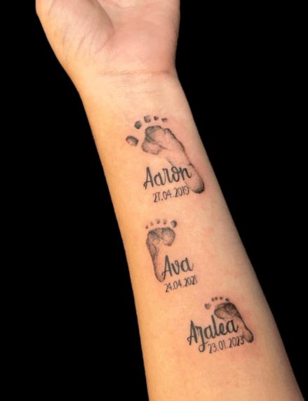 80+ Baby Footprint Tattoo Ideas To Celebrate Your Bundle Of Joy Footprints Tattoo Ideas, Footprint Memorial Tattoo, Footprint With Name Tattoo, Tattoo Ideas For Newborn Daughter, Tattoo Ideas Female For Son, Child Footprint Tattoo, Kids Footprint Tattoo, Baby Handprint Tattoo Ideas, Matching Baby Tattoos For Parents