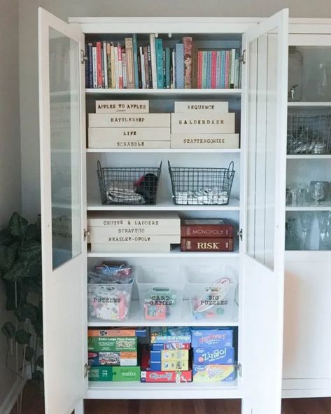 5 Smart and Stylish Board Game Storage Ideas - How To Store Board Games | Apartment Therapy Book And Board Game Storage, Game Cabinet Organization, Board Game Cabinet, Board Game Storage Cabinet, Board Game Storage Ideas, Game Storage Ideas, Board Game Shelf, Games Storage, Cabin Makeover