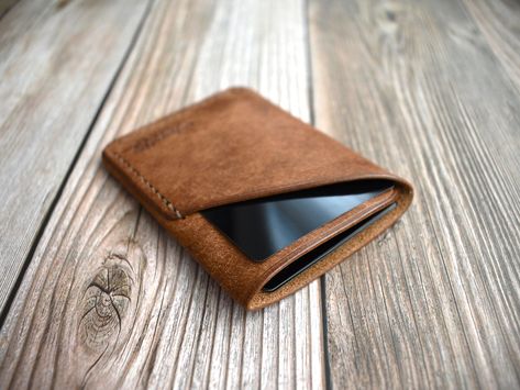 "The No. 01 Cardholder Our minimalist Wrap wallet made with vegetable-tanned \"Walnut\" Pueblo leather from Badalassi Carlo. This leather is famous for its unique rustic texture and will become even more beautiful as it patinas over time with use. This wallet is perfect for those who like to travel light, with a slim profile that provides a comfortable carry in either the front or back pocket. Additional details: - 100% Handmade. - 2 card slots - Hand-stitched using traditional saddle stitch tec Wrap Wallet, Cardholder Wallet, Saddle Stitch, Rustic Texture, Minimalist Wallet, Card Holder Wallet, Travel Light, Everyday Carry, Vegetable Tanned Leather