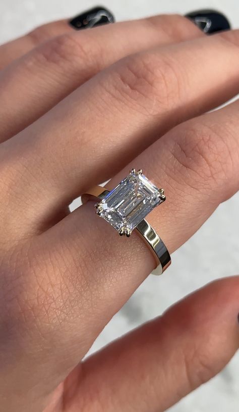 4ct emerald cut diamond on a flat yellow gold band Emerald Cut Thick Gold Band, Emerald Cut Engagement Ring Thick Band, Engagement Rings With Thick Band, Emerald Cut Thick Band, Emerald Cut Engagement Ring With Band, Thick Gold Band, Radiant Cut Rings, Emerald Wedding Band, Emerald Cut Engagement Ring