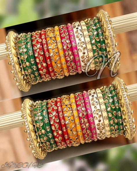 Indian Designer Multi Color Bridal Bangles Set. Decorated With Glass Kundan Work All Over. Made On Acrylic Base. All The Popular Colors In This Beautiful Ensemble Are Ready To Go With Every Of Your Dress. Be An Angel And Create A Splendid Impact On Everyone By Wearing This Gorgeous Design. This is a set of 28 Bangles (14 Bangles For Each Hand). Glass Bangles Set Indian, Colorful Bangles Indian, Glass Bangles Indian, Elizabeth Arden Green Tea Perfume, Multi Color Bangles, Colourful Bangles, Bangle Collection, Silk Thread Bangles Design, Punjabi Style