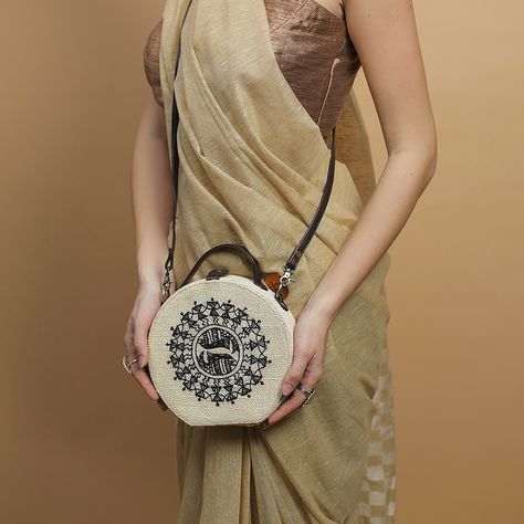 Elevate your style with a touch of tradition. Experience the beauty of handcrafted artistry with our latest hand embroidered sling bag, adorned with exquisite hand-embroidered Warli art by skilled tribal artisans. Each piece is a testament to unique cultural heritage and sustainable fashion, merging timeless craftsmanship with modern elegance. **Key Features:** - **Sustainable:** Made with eco-friendly practices - **Hand Embroidered:** Featuring intricate Warli art - **Artisanal:** Crafted ... Warli Art, Animal Products, Art Bag, Cultural Heritage, Modern Elegance, Elevate Your Style, Sling Bag, Slow Fashion, Sustainable Fashion