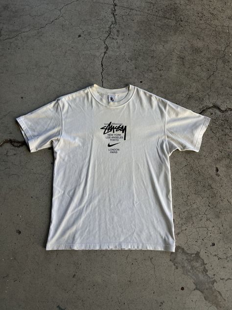 Nike x Stussy International Tee Stussy T Shirt, Stussy Clothing, Streetwear Wallpaper, Stussy Tee, Nike X Stussy, Paris Tee, Vintage Outfit, Men's Tops, Tee Shirt Designs