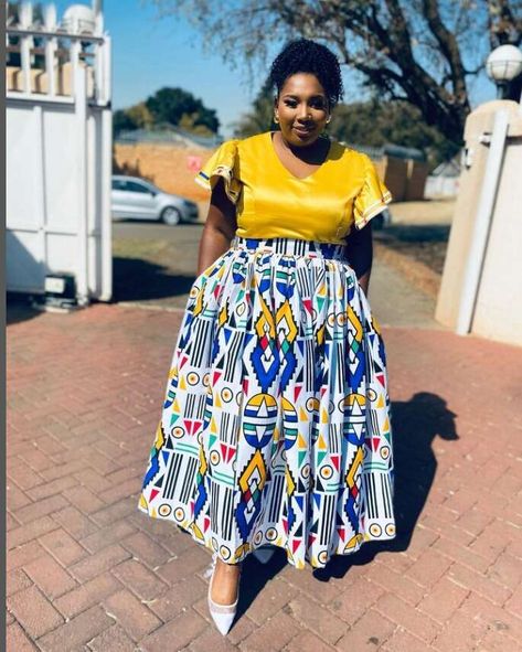 Clipkulture | 18 Shweshwe Designs You Should Consider Shweshwe Skirts, Ndebele Attire, Ndebele Traditional Attire, Shweshwe Dresses Patterns, Shweshwe Designs, Triangle Braids, Cultural Fashion, African Attire Dresses, African Hats