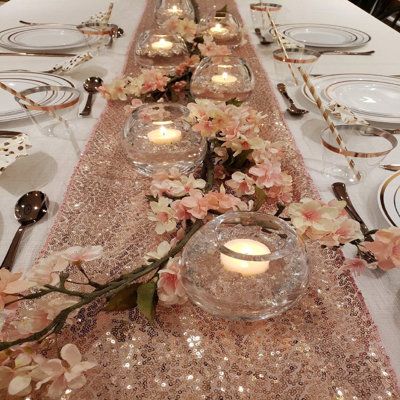 Sequined sparkling shimmer Table Runner . Size 12" x 108" Coverd with 3mm of Sequins . Available now in rose gold pink (check our other listings ) Stain resistant and easy to clean. FashionSecretsLLC | FashionSecretsLLC Sequins sparkling glitzy shimmery table cloth for parties 108.0 H x 12.0 W x 0.1 D in pink / yellow | 108" H X 12" W X 0.1" D | Wayfair Rose Gold Table Setting, Rose Gold Party Theme, Gold Theme Party, Gold Table Setting, Rose Gold Table, Rose Gold Party Decor, Table Rose, Rose Gold Theme, Quince Decorations