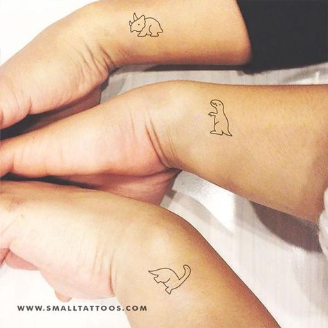 We provide real looking temporary tattoos that last between 2 and 10 days. Exceptionally designed wearable art fueled by our love of collaboration with the professional tattoo world. 3 Matching Dinosaur Tattoos, Three Bestie Tattoos, 3 People Tattoo Ideas, Siblings Tattoos, T Rex Tattoo, Girl Spine Tattoos, Group Tattoos, Faith Tattoo On Wrist, Sister Tat