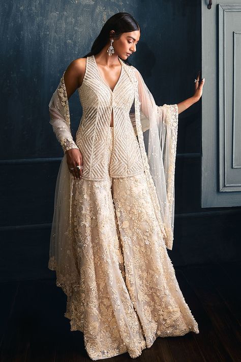 Shop for these amazing collections of Ivory Net Embroidered 3d Floral Motifs V Neck Kurta Sharara Set For Women by Seema Gujral online at Aza Fashions. Floral Sharara, Seema Gujral, Sharara Designs, Sangeet Outfit, Crystal Embroidery, Indo Western Dress, Indian Dresses Traditional, Designer Party Wear Dresses, Party Wear Indian Dresses