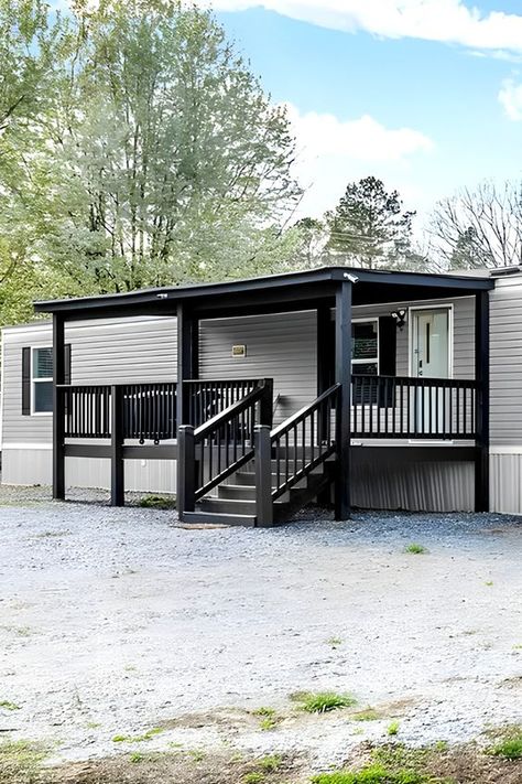 Mobile Home Charcoal Black Porch - Get inspired with these 10 vibrant and stylish color ideas for your mobile home porch! From bold blues to warm yellows, these colors will make your porch the envy of the neighborhood. Add some curb appeal and personality to your home! Trailer Home Porch Ideas, Front Porch Ideas Trailer, Front Porch Trailer Home, Front Porch Ideas For Manufactured Homes, White Manufactured Home Exterior, Front Porch Diy Makeover, Grey And Black Mobile Home Exterior, Cute Manufactured Homes, Trailer House Porch Ideas Single Wide